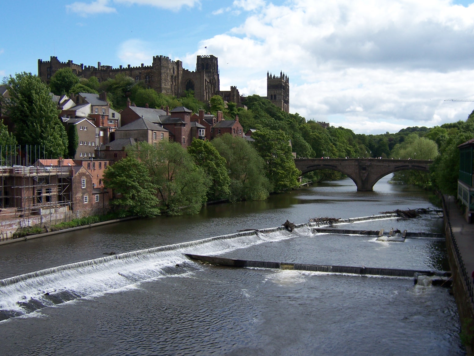 View of Framwellgate Bridge, Durham Cathedral and Durham Castle taken from Millburngate Bridge on the River Wear.